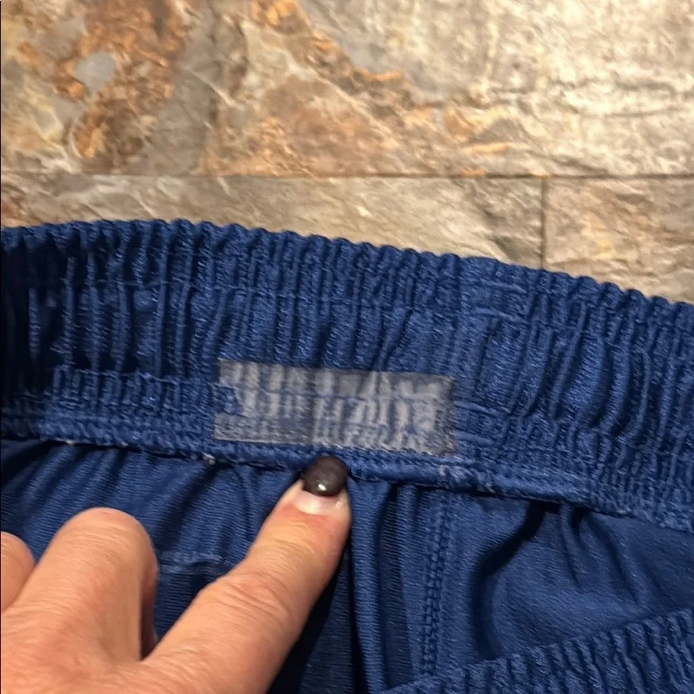 Under Armour Kids' Dual-Tone Blue and Orange Shorts - Picture 7 of 14